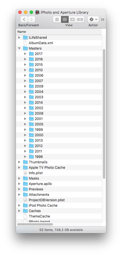Inside the iPhoto and Aperture Library folder. Icons and databases.